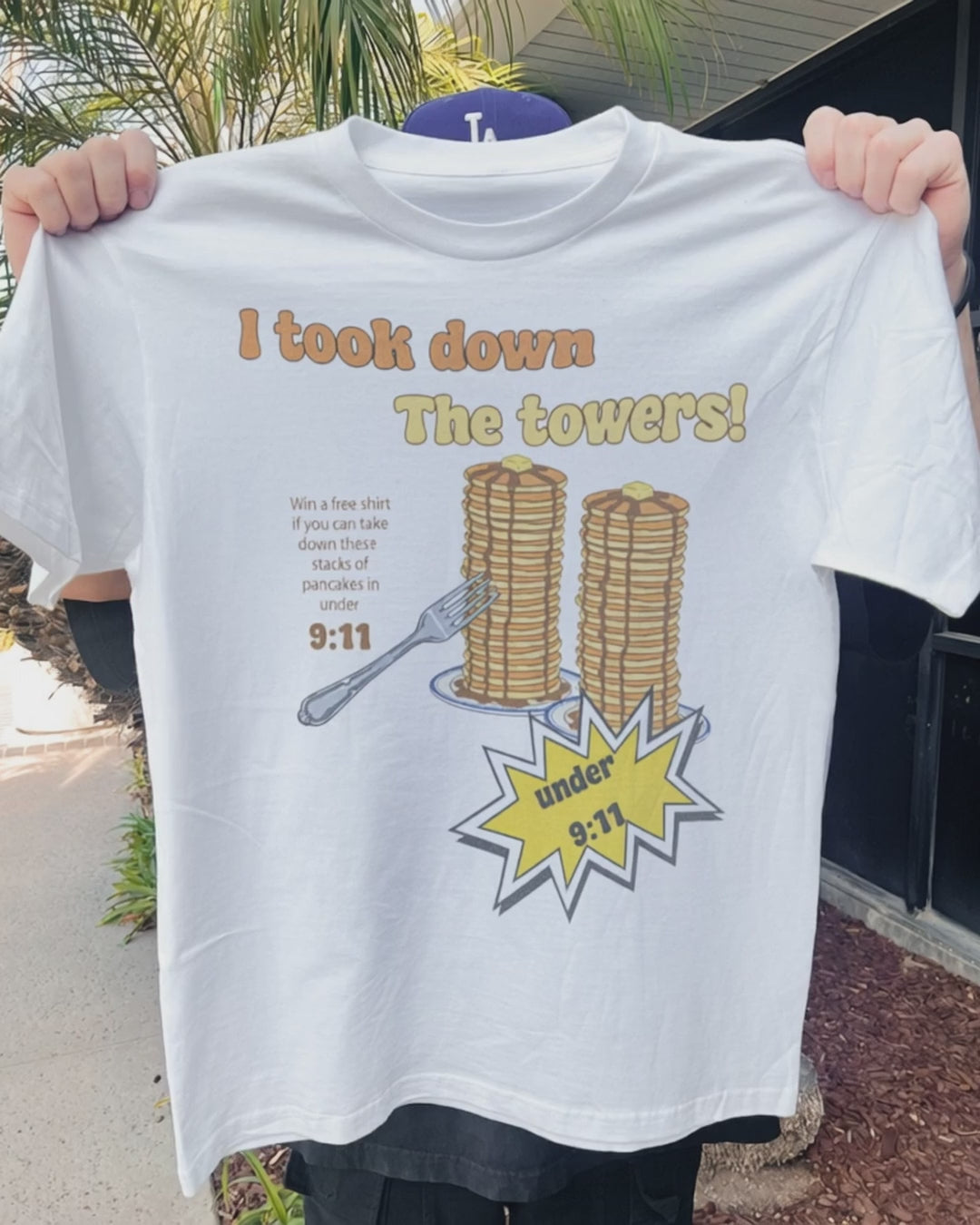 9:11 'I Took Down the Towers!' Pancake Challenge Vintage Washed White Tee product video [GB-DPA:92014c221532]