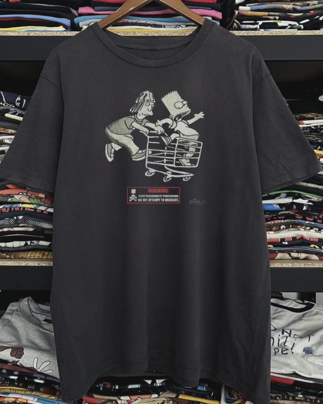 2001 Simpsons x Jackass Washed Black Tee product video [GB-DPA:5a38ba2b8898]